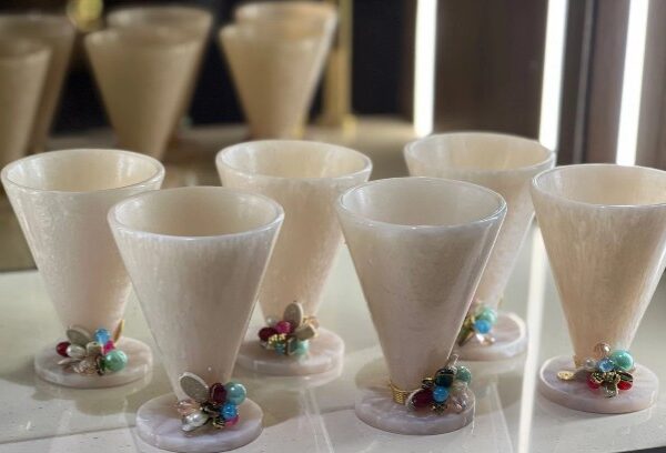 Resin white cone with wire and stonework